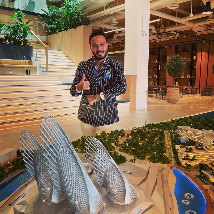 Ayoub beside the Saadiyat Grove model